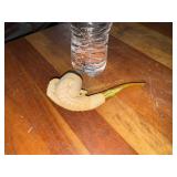 Carved claw pipe