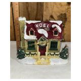 Home for the holidays light up NOEL house
