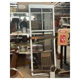 Vintage screen door with Ideal advertising door