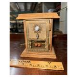Bank made from vintage post office box door