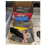 Antique toy trains with extra tracks