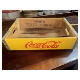 Yellow wooden Coca-Cola drink crate