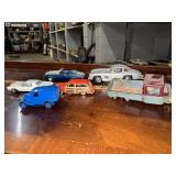 Group of die cast and tin toy cars