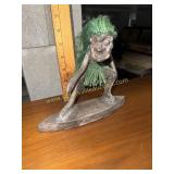 Wood carved surfer