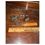 Cast iron open here bottle openers and