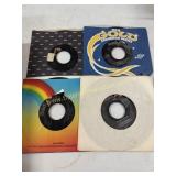 4 Elvis Presley 45s