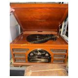 Crosley record player with CD player, radio and
