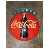 Coca-Cola button sign