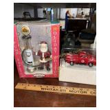 Amoco gas pump and Santa and Texaco truck