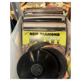 Tote of vinyl records and other media