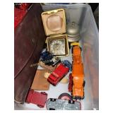Toy cars, travel clock, service bell