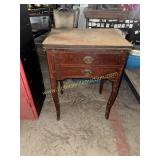 Sewing machine cabinet