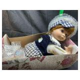Porcelain doll in box