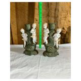 Pair of Porcelain Figural Cherub Candlestick Holders