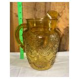 Amber Glass Pitcher with Molded Daisy Pattern