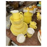 Yellow Dinnerware Set with Creamer and Lidded Canisters