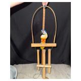 Hand carved parrot on perch wind chime