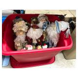 Collection of Santa Claus Figures in Red Storage Bin