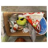 Box of Christmas decor and collectibles