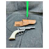 Toy cowboy pistol and holster