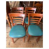 Set of four cafe style wooden chairs