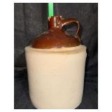 Gallon stoneware jug some chips on spout
