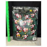 Vintage 1990s Bucilla Santa and pals felt appliqué Christmas ornament kit
