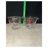 Pyrex and fire king measuring cups