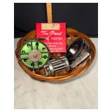 Vintage fishing reels and pencil sharpener