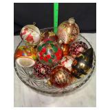 Glass bowl full of vintage Christmas ornament balls