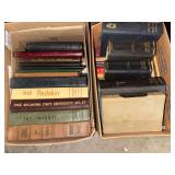 2 boxes of various school yearbooks and other books