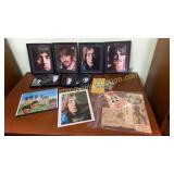 Framed Beatles photos and paper goods-stamps
