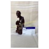 Detailed skinny old man wood carving