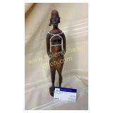 African carved woman damage to one ear pictured