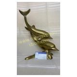 Brass dolphin statue