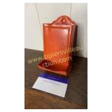 Orange tin match holder