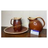 Brown drip platter and 2 pitchers