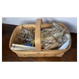 Basket with wooden clothes pins and misc
