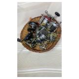Basket of vintage fishing reels