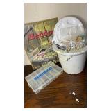 Modern Heddon sign, lures and minnow bucket