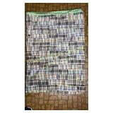 Homemade quilt with gingham back