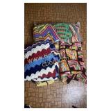 Large group of Afghans and blankets