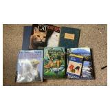 Group of bird, cat and nature books