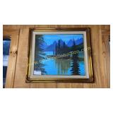 Framed lake painting on canvas
