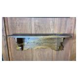 Carved oak wall shelf