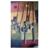 Group of 4 fishing rod and reels zebco and