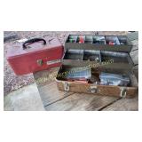 Two vintage metal tackle boxes one has some