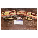 3 vintage Heddon fishing lures in boxes