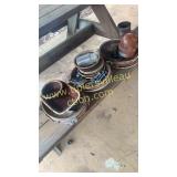 Group of brown drip pottery needs cleaned