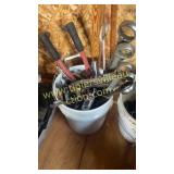 Bucket of large wrenches and miscellaneous tools